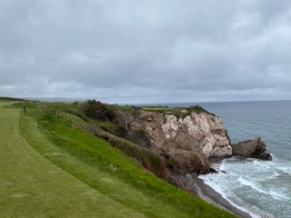 A clifftop green above the surf at Cabot — from Miles's trip