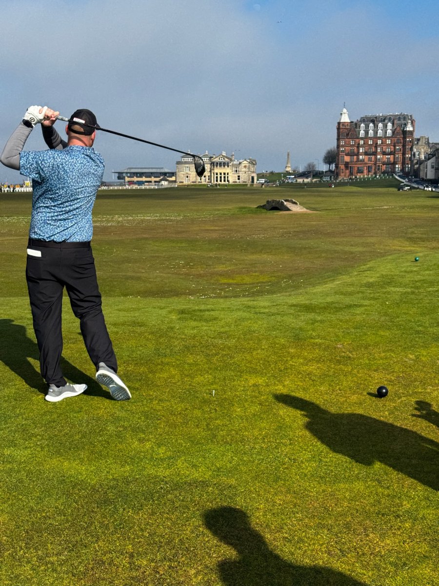 Miles Hood driving the 18th at the Old Course, St Andrews